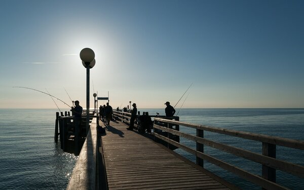 Seebrücke in Wustrow,, Foto: PtrQs, CC BY-SA 4.0, https://commons.wikimedia.org
